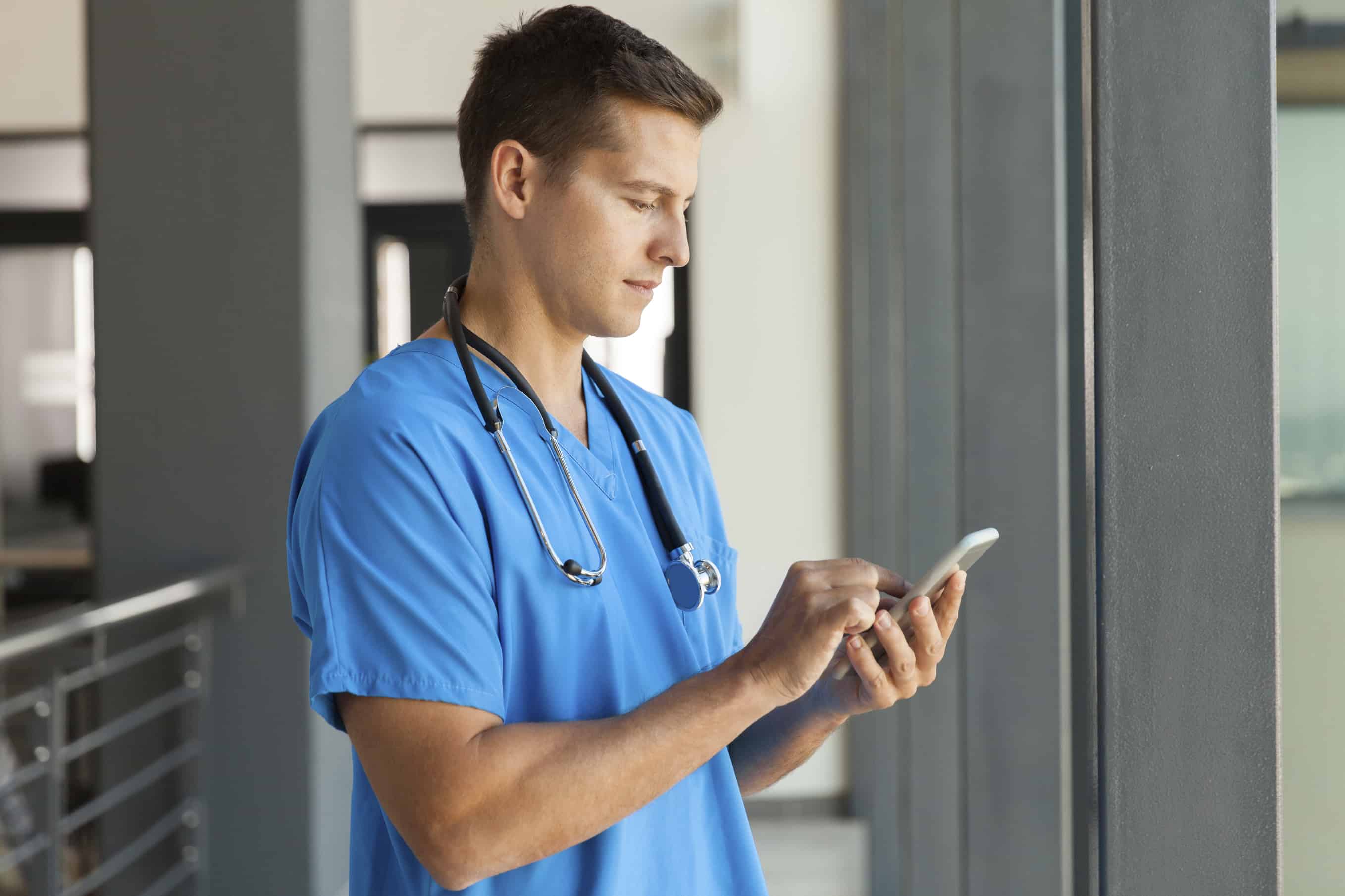 modern medical professional using smart phone
